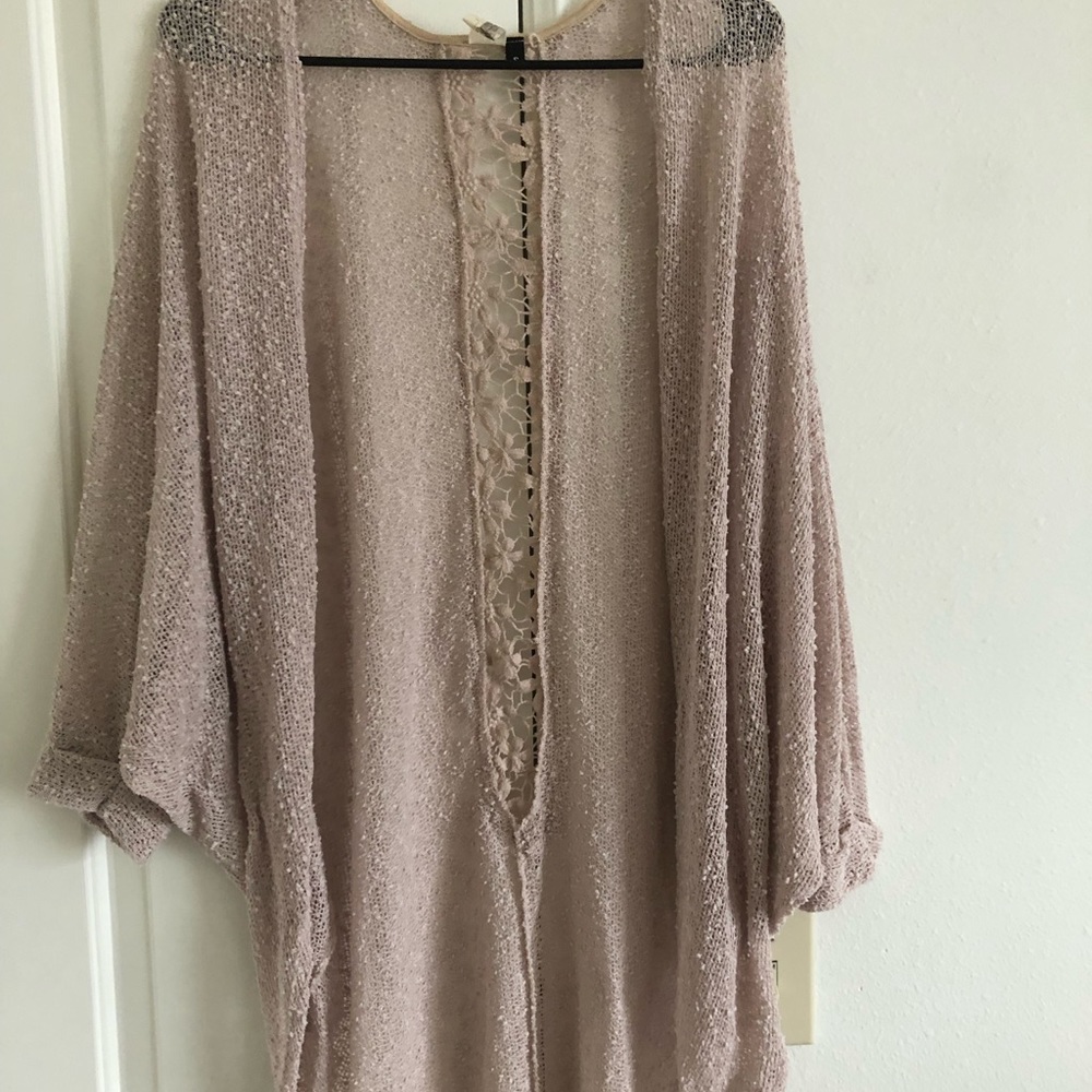 Beige lace kimono.